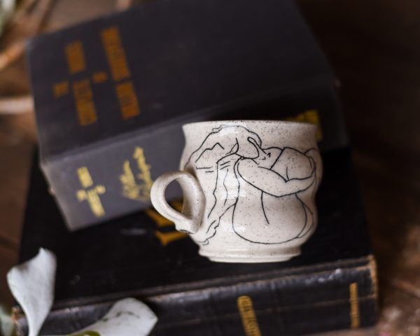 held by the wind mug by janah james